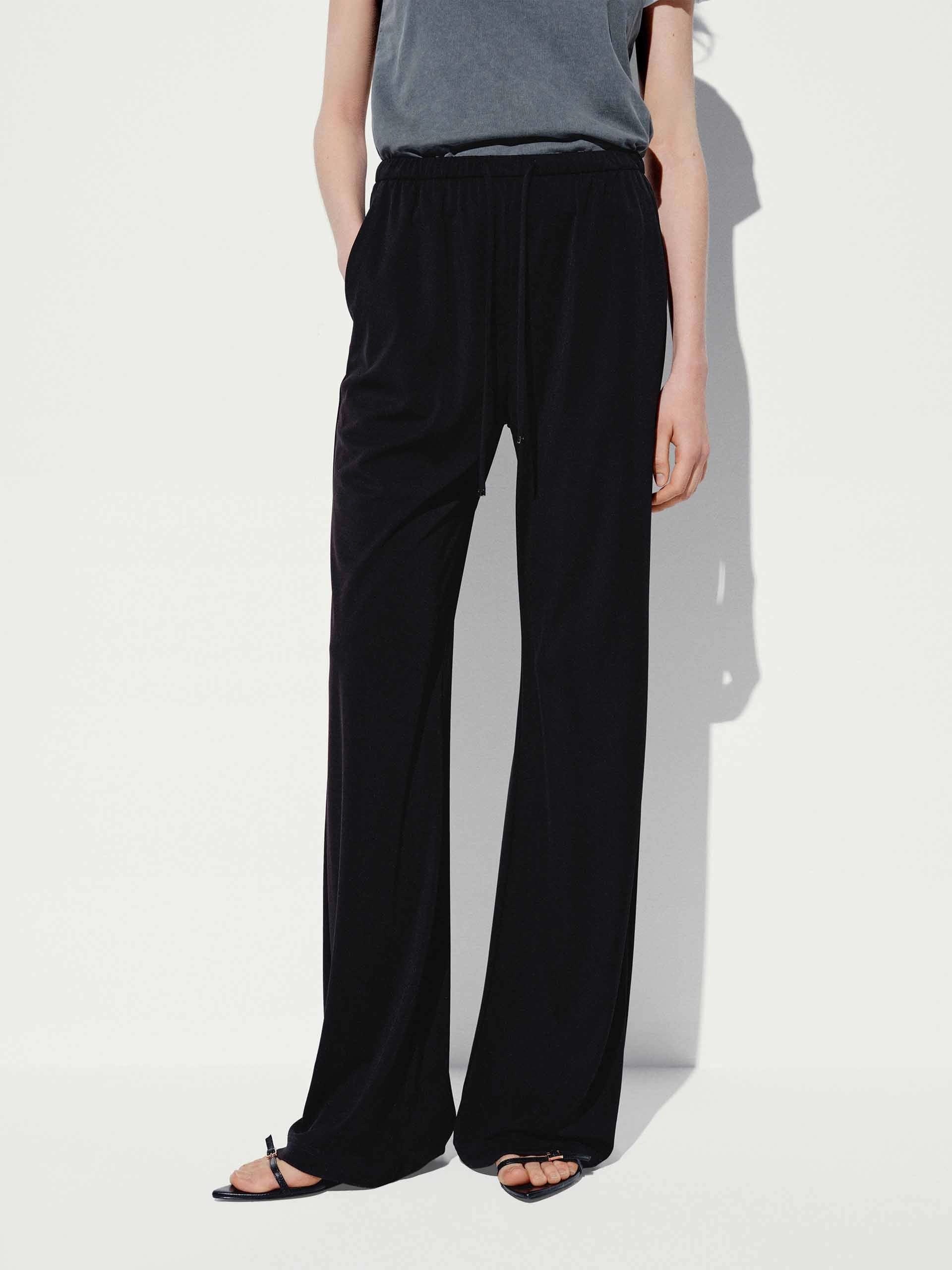Chic Design Core Fit Drawstring Waist Flared Trousers